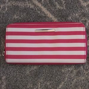 Three wallets all leather type material